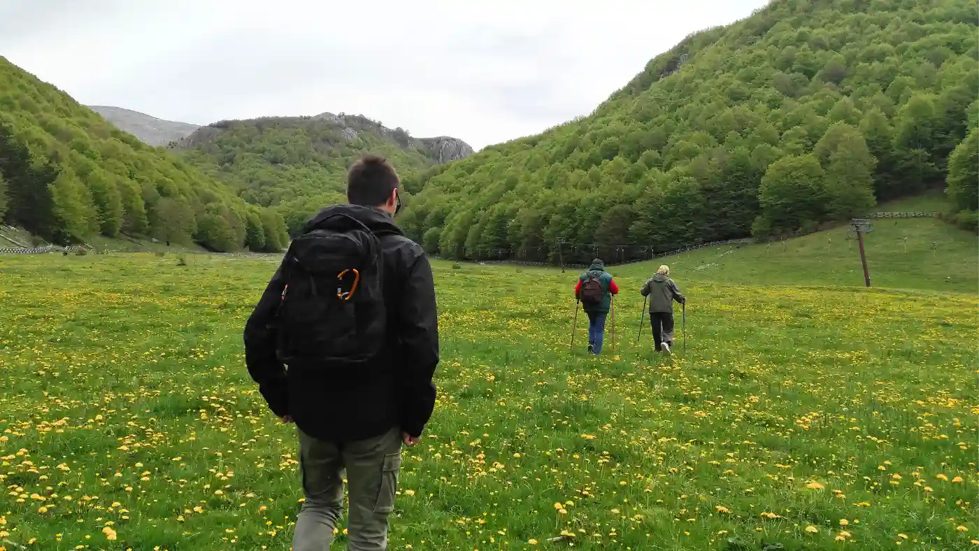 Trekking with and without hiking poles in the mountains and nature of Italy.