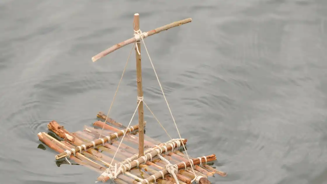 A miniature makeshift raft in the water.