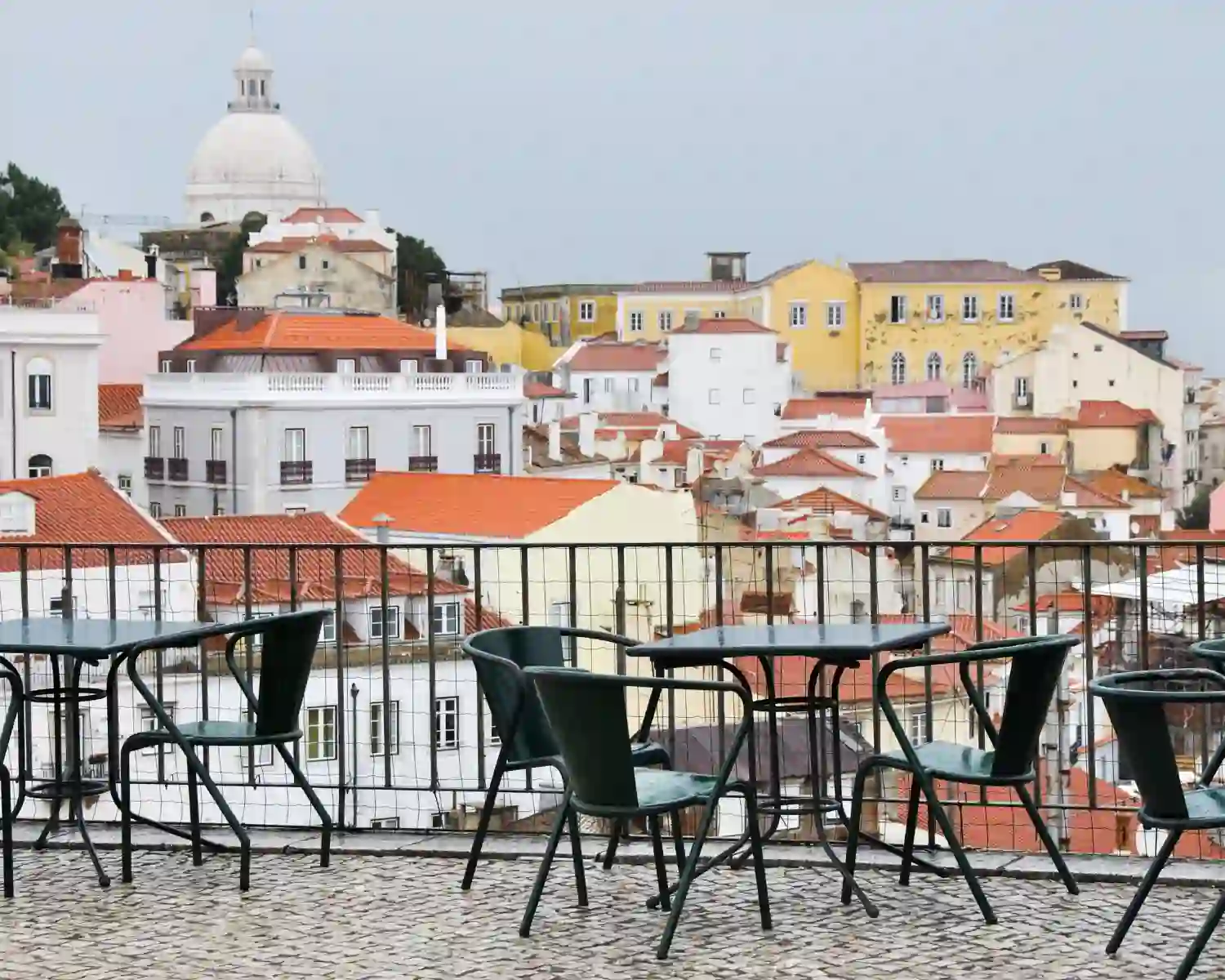 Terrace and view from the Portas do Sol viewpoint in Lisbon, Portugal.