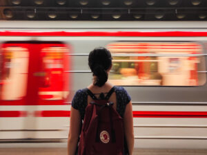 Travelling light with just a backpack in the metro of Prague, Czech Republic.
