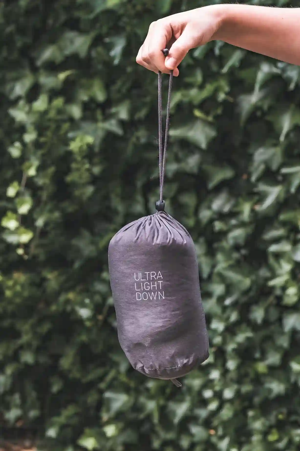 The Uniqlo Ultra Light Down Jacket in its carrying bag.