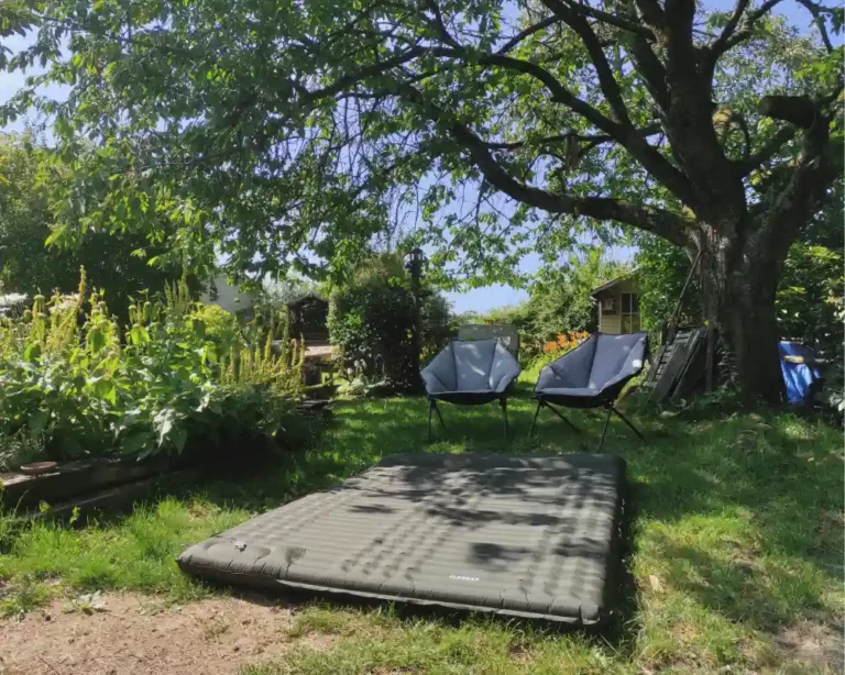 Overview of the Elegear sleeping pad inflated and being used outdoors.