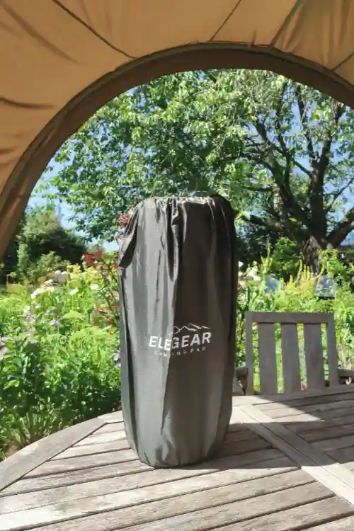 Elegear sleeping pad packed up in its small compression pouch.