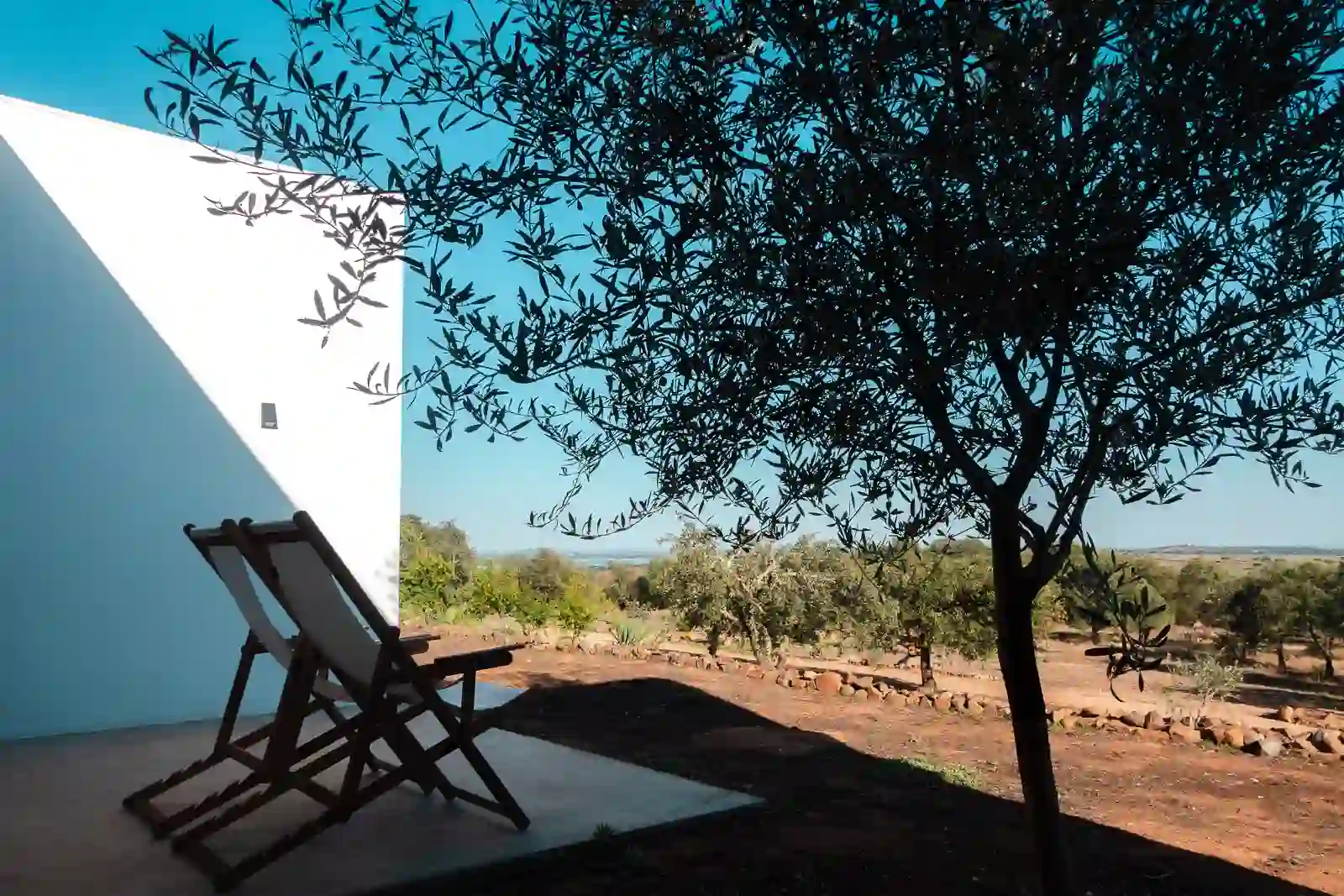 Private terrace with amazing views over the Alentejo landscape at the Montimerso Skyscape Country House hotel in Portugal.