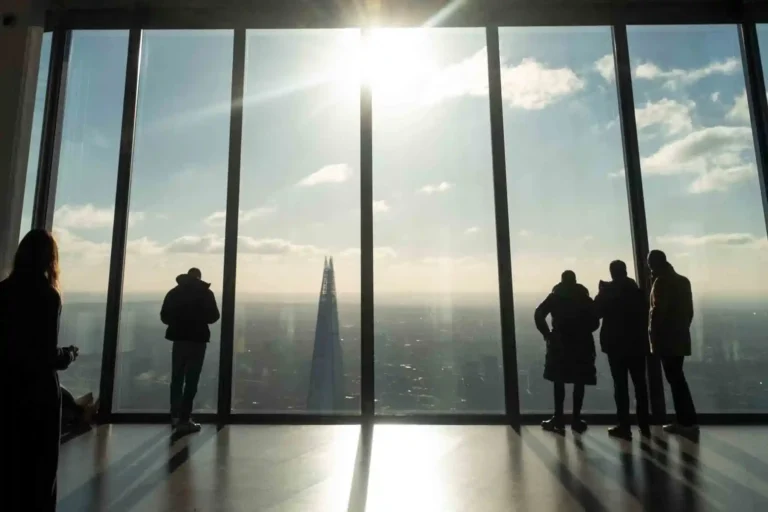 Visitors admire London's skyline from the top floor of the Horizon 22 building.