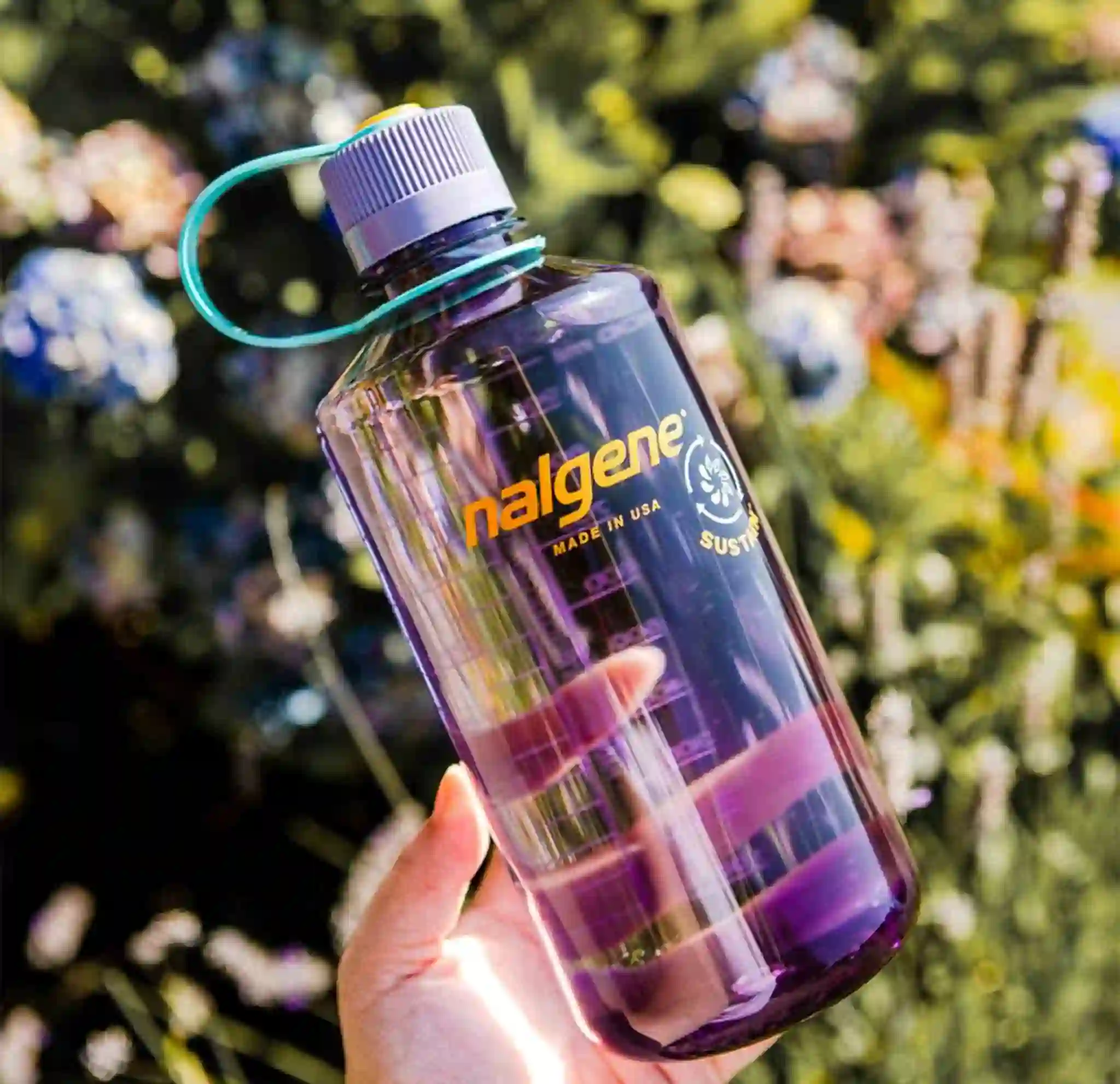 Close up of a Nalgene sustainable water bottle.