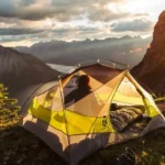 A Nemo tent set up in a mountainous area.