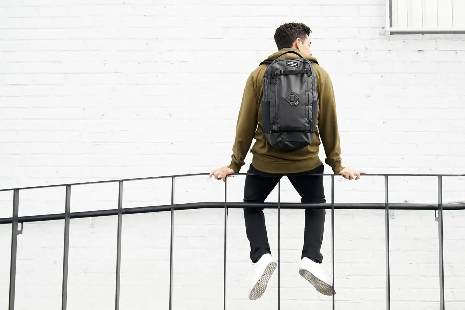 Dakine Urbn Mission 23 litres backpack, one of the best carry-on backpacks for travel.