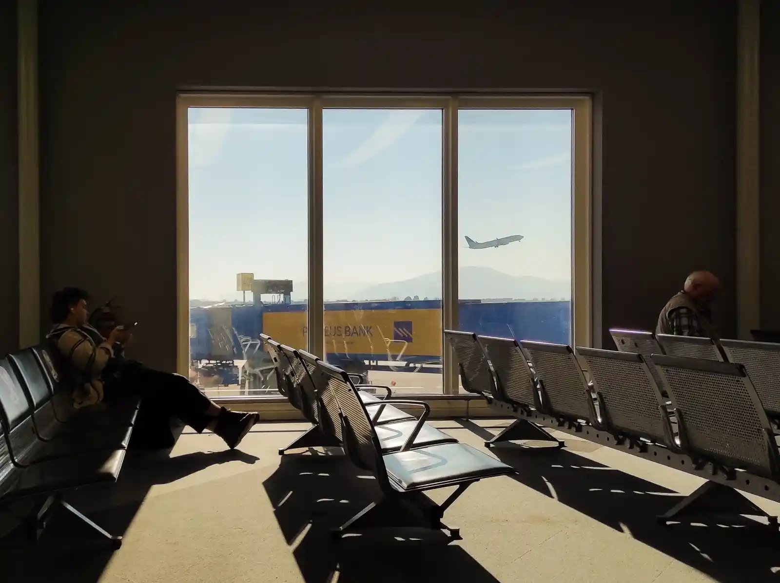 Passengers waiting at the airport to board their long haul flights.