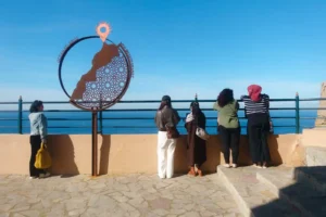 Tourists enjoying the sea views from the Cap Spartel in Tangier, Morocco.