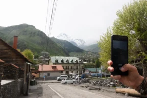 Kazbegi town centre, also known as Stepantsminda, surrounded by the Georgian mountains.