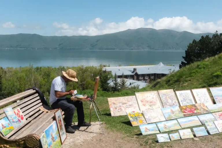 An artisan and painter performing his craft by the Lake Sevan in Armenia.